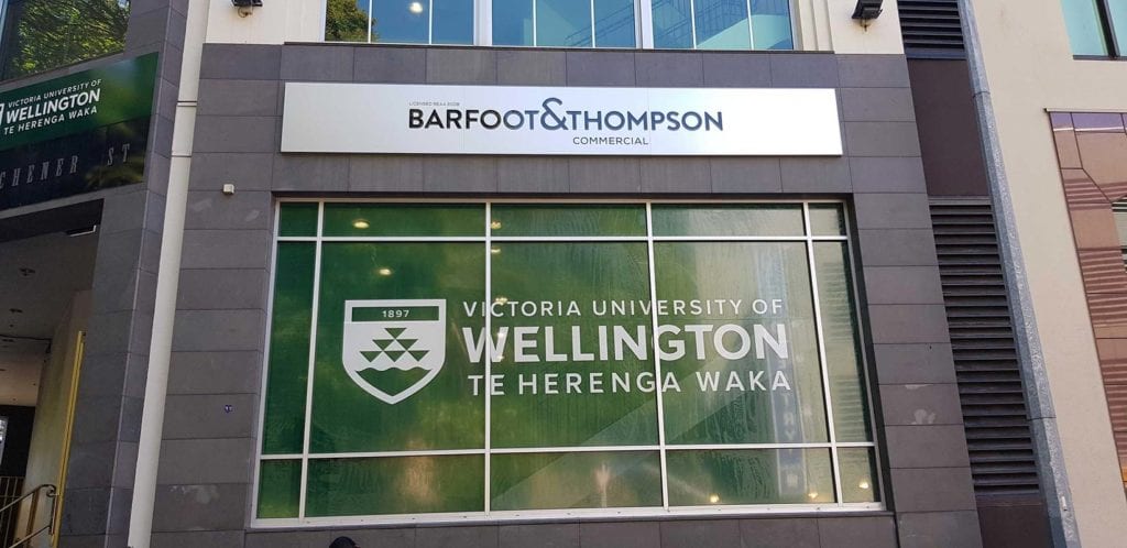Barfoot and Thompson window Advertising for Victoria University - with film overlay project management of major signage rollouts by signwise auckland